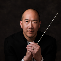 Photo of conductor Kelly Kuo with Arizona Opera