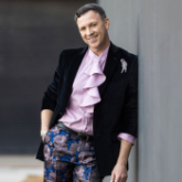 Photo of director and choreographer Kyle Lang with Arizona Opera