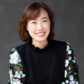 Photo of Chorus Director Kyung-Eun Na with Arizona Opera